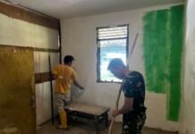 Tahap Finishing RTLH Bapak Kariono Berlanjut, Satgas TMMD Kodim 0418/Palembang Fokus Pengecatan Rumah